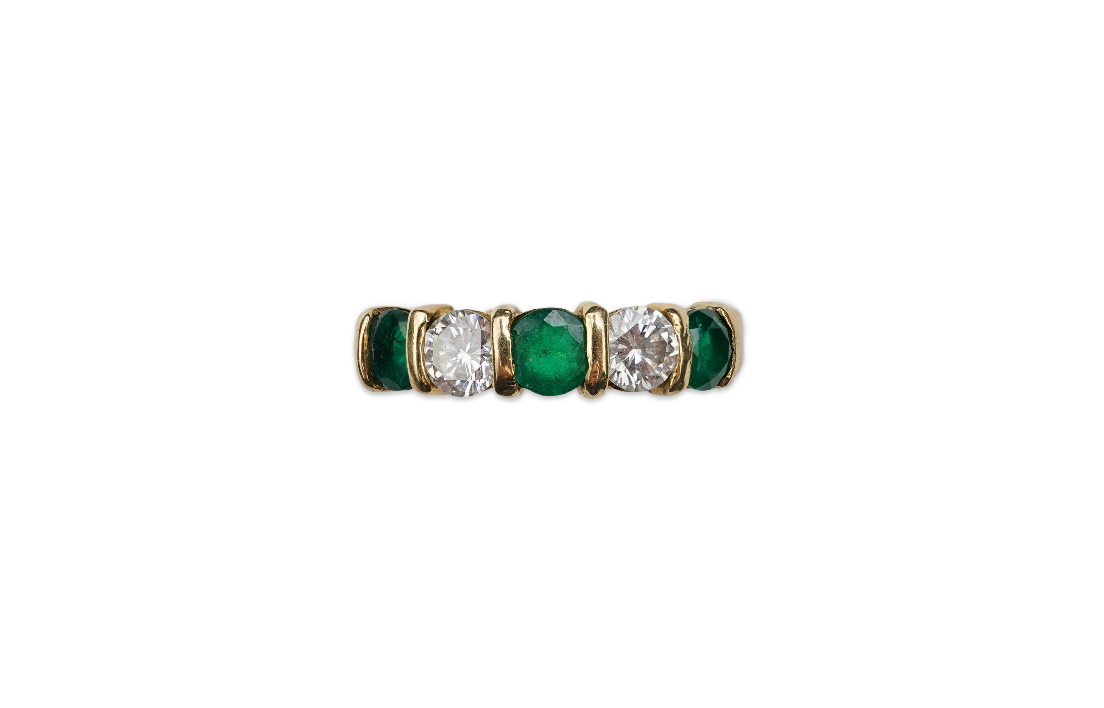An emerald and diamond five-stone ring
